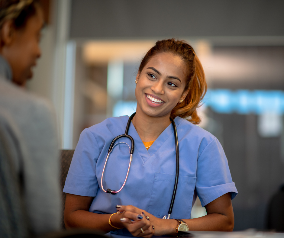 Healthcare professional in scrubs with stethoscope